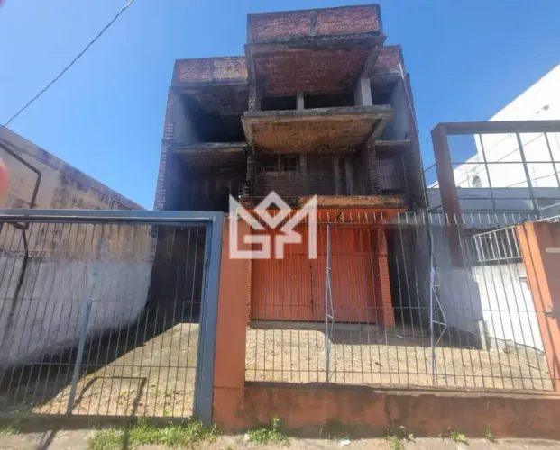 Prédio com 3 andares e amplo estacionamento no bairro Higienópolis