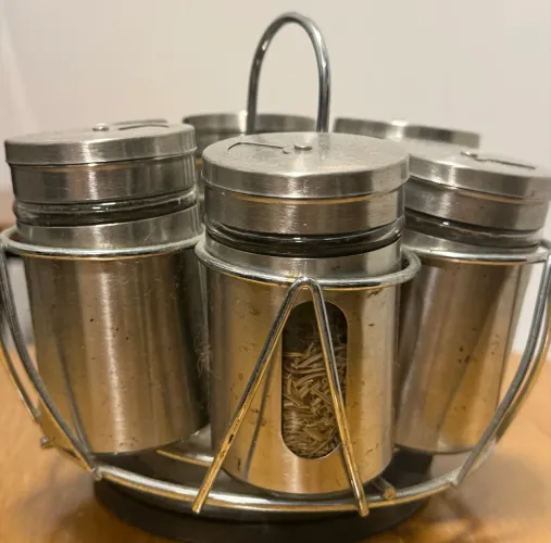 Porta temperos redondo em inox com base giratória e 6 potes em vidro/inox 
