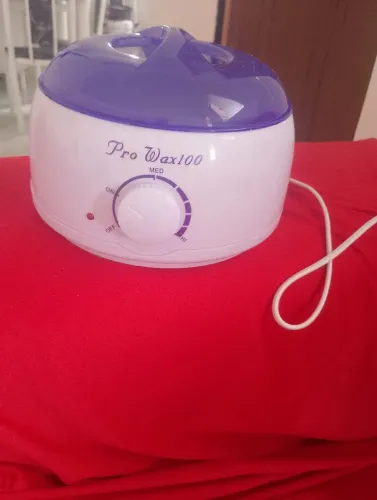 Vendo uma panela de cera usada só uma vez