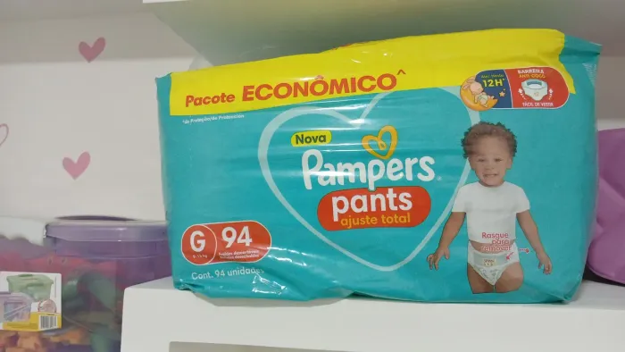 Fralda pampers ajuste total G