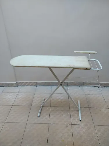Tábua de passar roupa usada