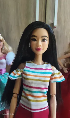 Boneca barbie delux w1 perna protetica 