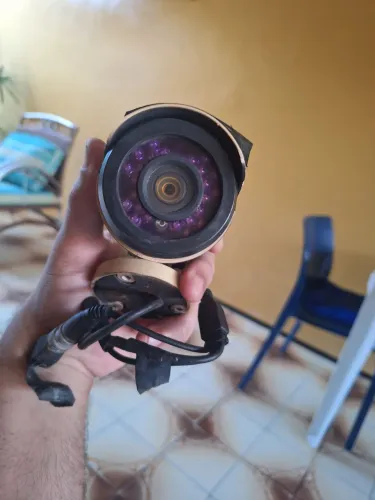 Câmera de segurança Sucata com as caixas 