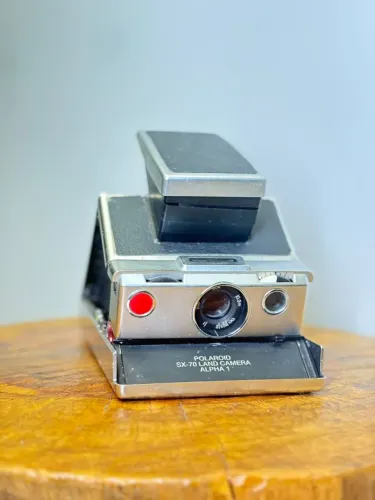 Câmera Polaroid SX-70 Land vintage Alpha 1 