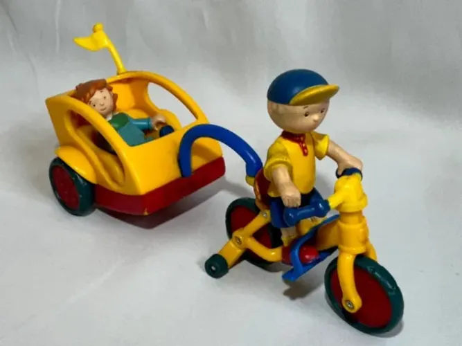 Caillou e sua irmazinha Rosie usado