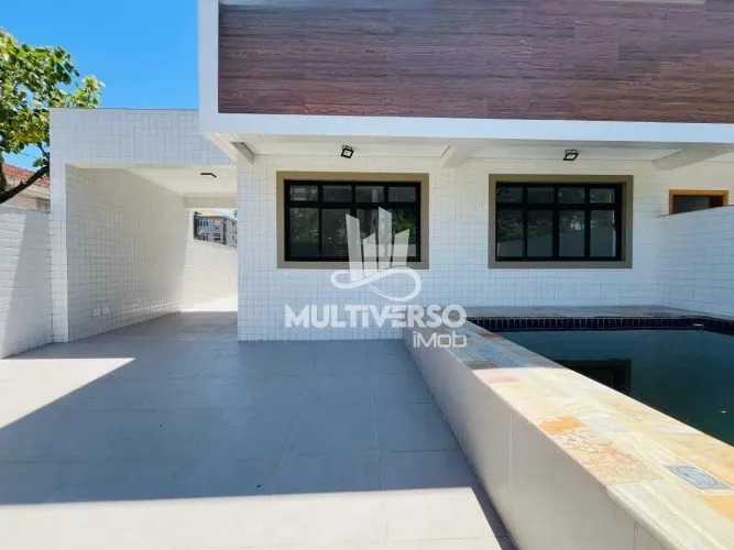 Casa à venda em Santos, Vila Belmiro 3 suítes, 3 vagas, piscina e churrasqueira