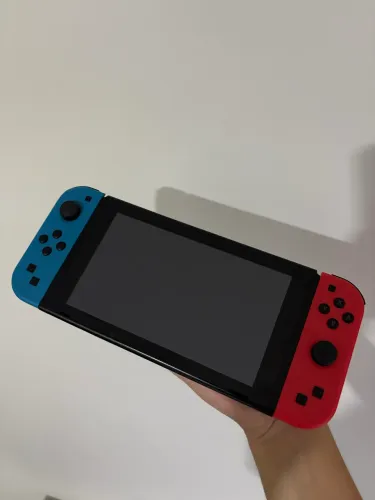 nintendo switch + case e acessórios