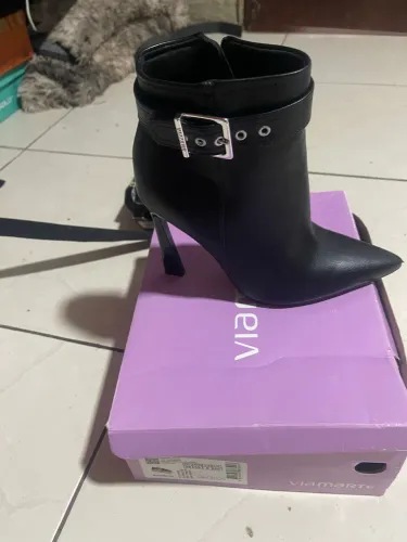 Bota salto alto