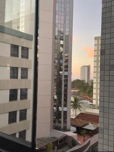 Apartamento na praia de areia preta com vista pro mar