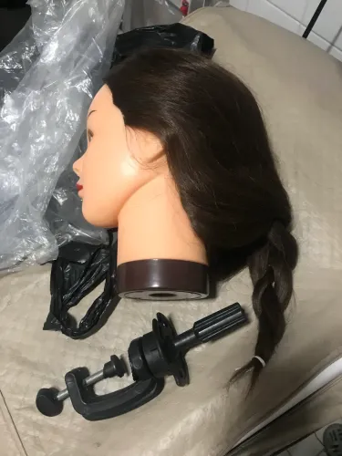 Cabeça de treinamento de penteado
