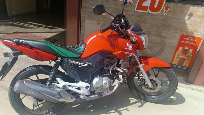 Moto muito bem conversando tudo certinho
