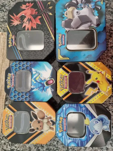 6 latas pokemon todas vazias