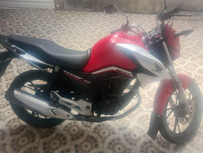 Titan locação de moto