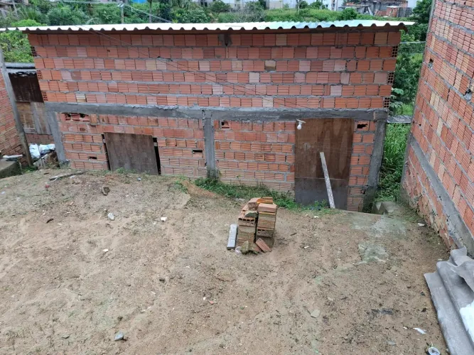 Terreno com casa semi acabada 50mil