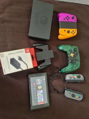 Kit Nintendo Switch v1 desbloqueado com sd 128 gb.