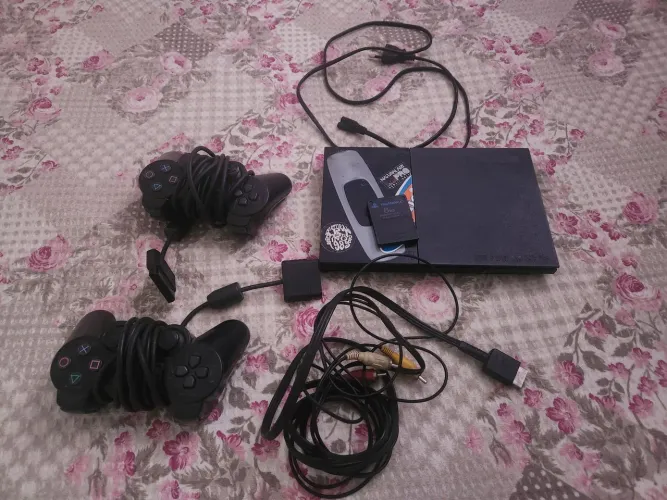 Playstation 2 sim+2 controles+1cards de memoria em ótimo estado
