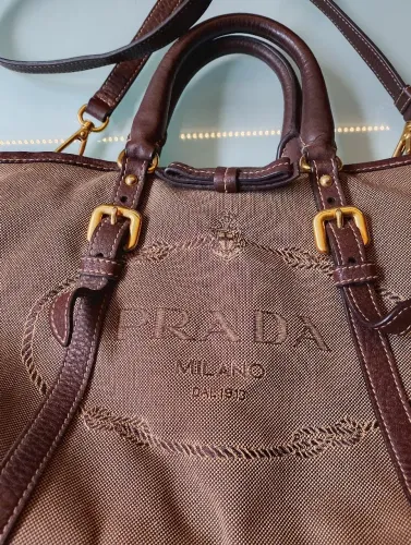 Bolsa Prada Milano Em Lona com de coura marrom 