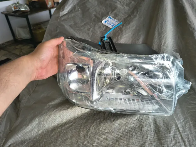 Farol novo direito / passageiro original do Fiat Uno Mille Fire 2005 a 2013