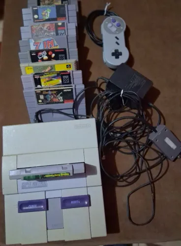 Vendo super Nintendo com  8 jogos. ( usado)