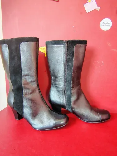 Botas de alto preta.