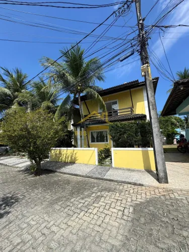 Lauro de Freitas Casa Duplex 4/4 3 suítes COM AREA Condomínio em Buraquinho
