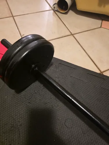Barra de treino e anilhas