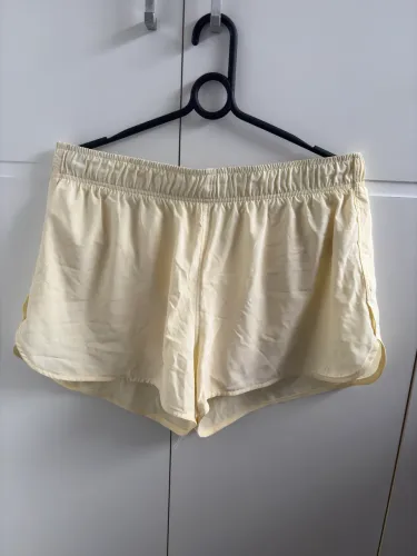 Shorts Academia Asics Sports