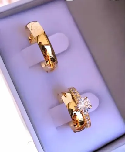 Par Alianças Tungstênio 4mm Banhada Ouro 18k Com Solitario Somos uma empresa especialistas