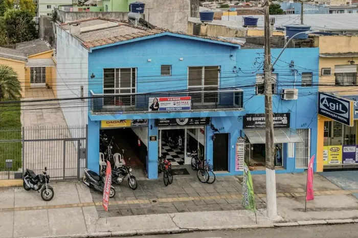 Prédio comercial com residência - oportunidade de investimento