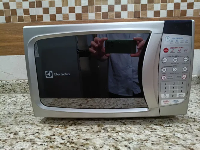 FORNO MICROONDAS COM DEFEITO