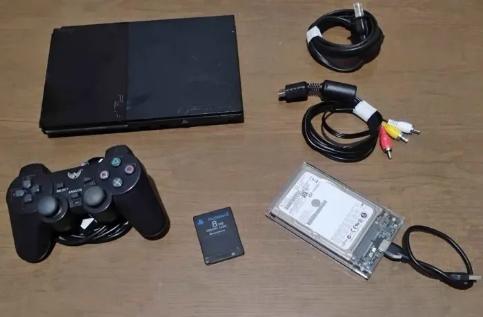 ? PlayStation 2 Slim + 60 Jogos - R$ 370