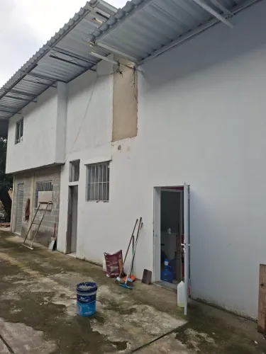 Loja com terreno residencial ou comercial. 