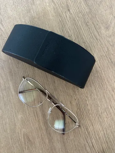 Armaçao oculos Prada