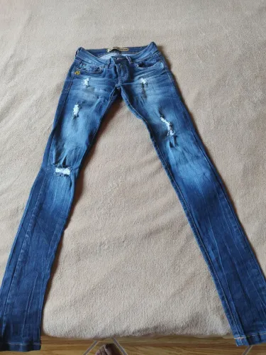 Calça jeans John John.