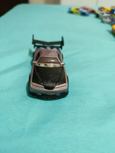 Miniatura boost com chamas lenticular Carros Disney Pixar- Mattel