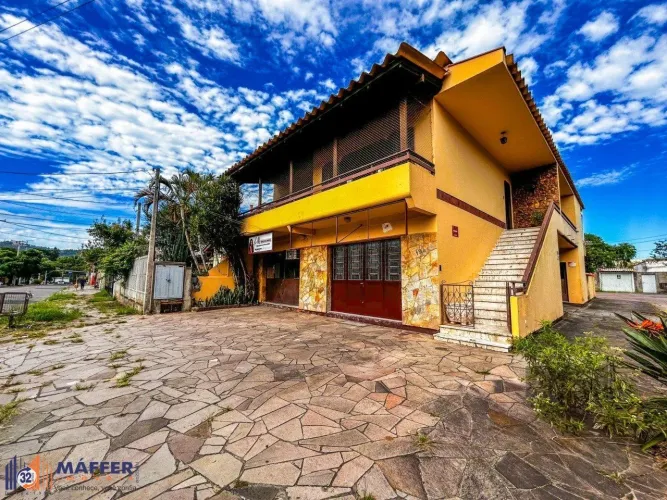 Casa de 3 Quartos, 1 suíte, garagem fechada, churrasqueira, na Cavalhada Poa/RS