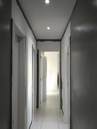 Pedreiro e equipe profissionais