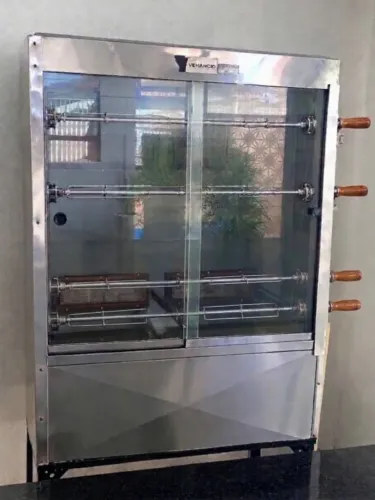 Máquina de frango assado