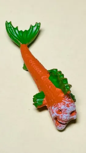 Acessório ideal p/ bonecos do Coringa / Joker - "peixe coringa" - altura 5 milimetros