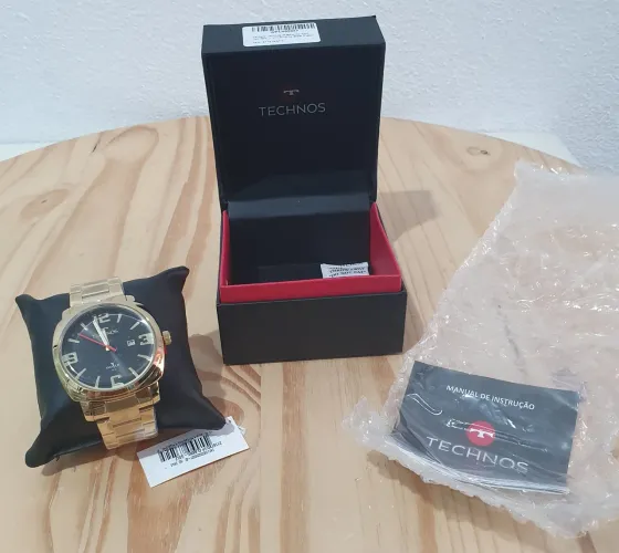 Relogio Technos original dourado modelo 2115txd/1p