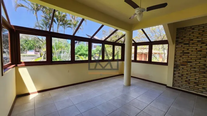 Casa com 4 dormitórios para alugar, 490 m² por R$ 14.880,00/mês - Rio Tavares Central - Fl