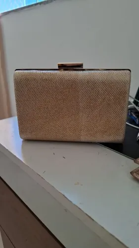 Bolsa clutch dourada