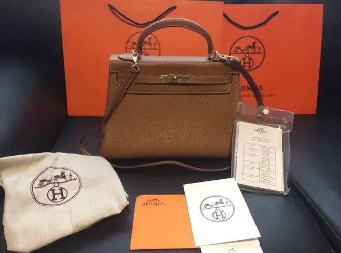 Bolsa Hermès Kelly Gold Clemence