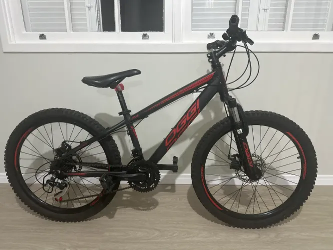 Bicicleta Oggi Hacker infantojuvenil aro 24 usada ótimo estado