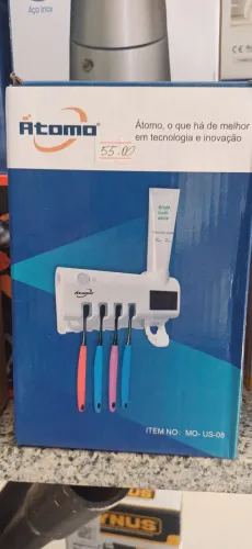 Dispenser de pasta de dente e suporte para escovas