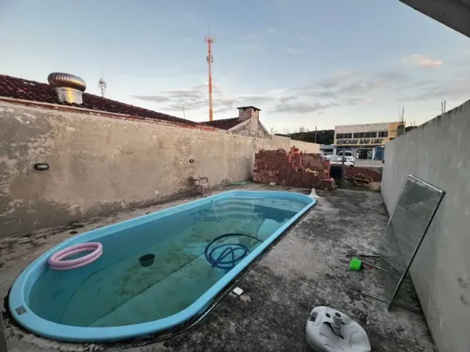 TERRENO 360m² COM PISCINA 3X7 A POUCOS METROS DA PRAIA EM GUARATUBA