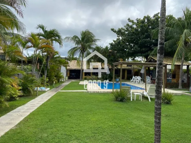 Casa para aluguel anual com 6 quartos piscina privativa em condomínio beira mar de Itacimi