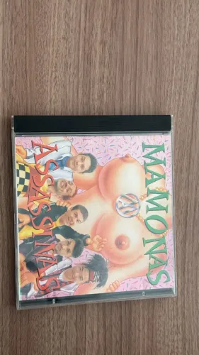 CD Mamonas Assassinas 1995 Original EMI - Encarte Completo e Adesivo Intacto