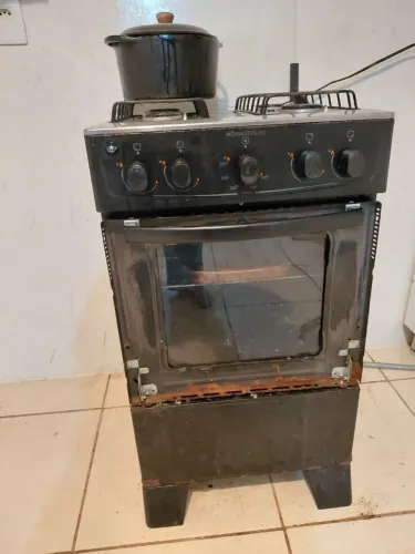 Fogão 4 bocas, porta do forno estrupiada