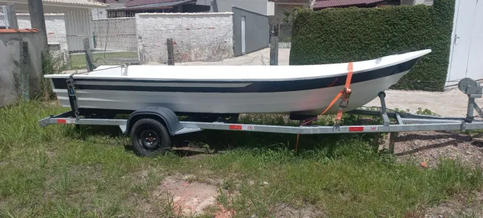 Barco fibra com reboque 